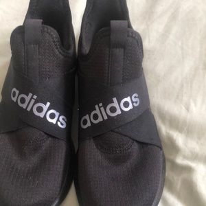 Black Adidas sneakers